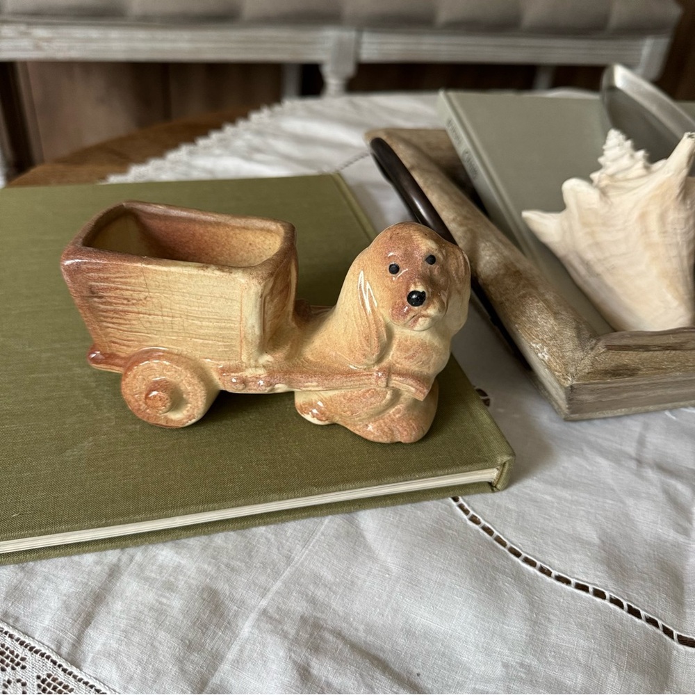 antique brown dog wagon plant pot